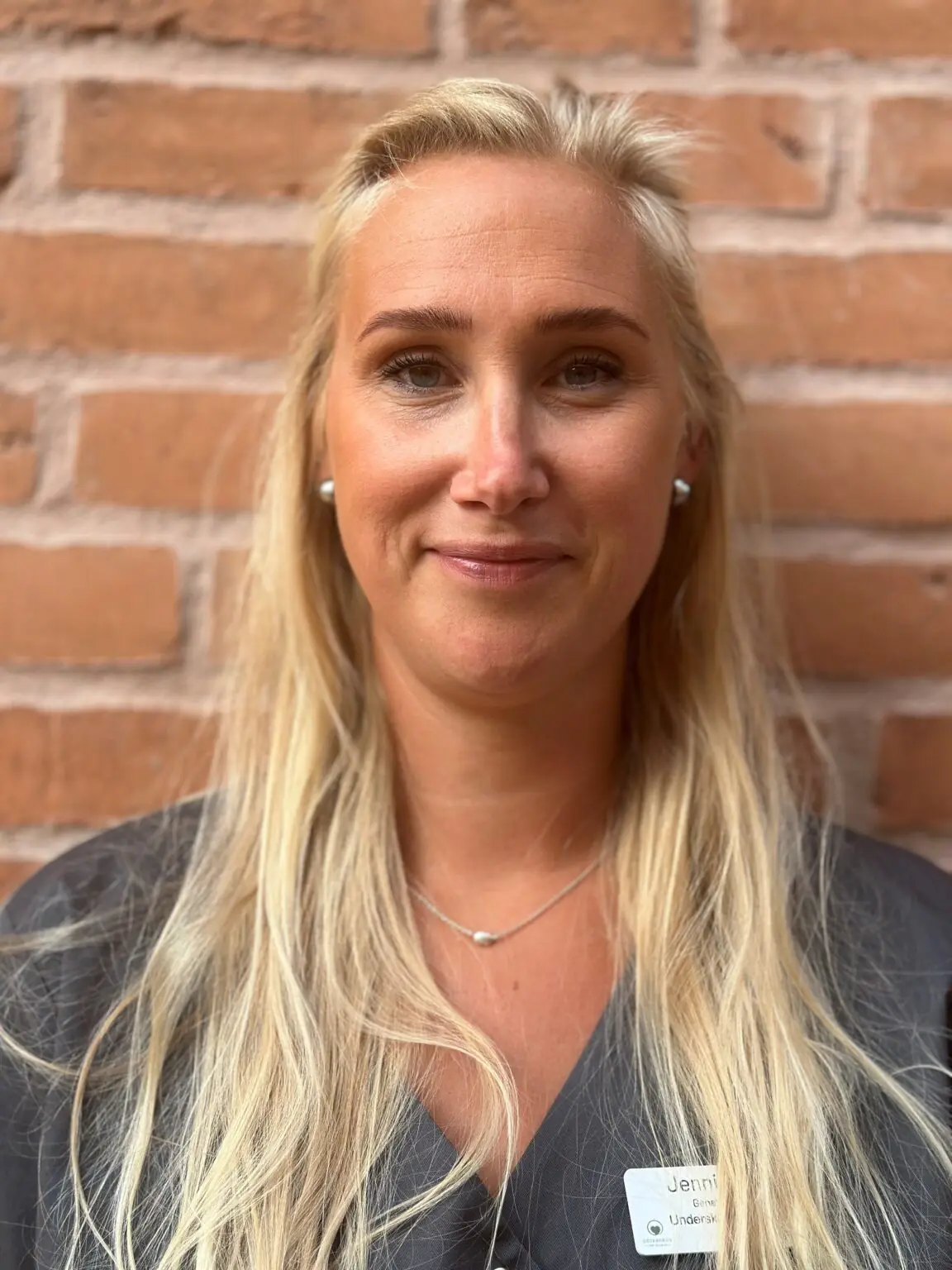 Porträtt av Jennifer Genetay